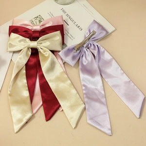 Elegant solid color satin bow hair clips with long ribbons in four various colors