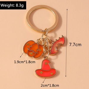 Halloween keychain detail showing dimensions 7.7cm length with pumpkin and bat charms