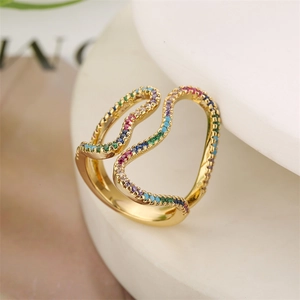Macro view of gold plated wavy double ring featuring multi-color micro-inlaid zircon stones