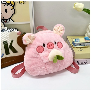 Close-up of pink plush pig backpack with embroidery and peach accessory for kids