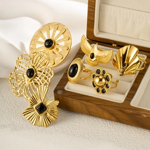 Bohemian gold plated stainless steel ring set with black stones and vintage carvings
