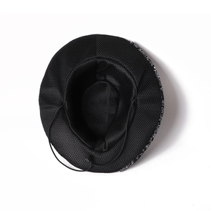 Detail view of the breathable mesh lining and adjustable windproof drawstring inside the hat