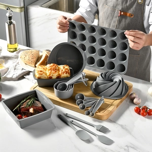 18-piece gray silicone baking set including muffin pans, toast molds, and measuring tools