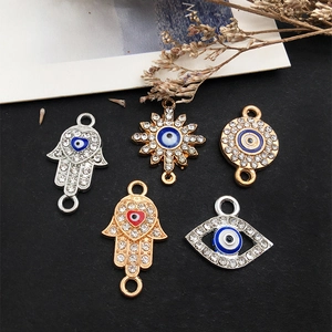 Hamsa Hand and Evil Eye charms in gold and silver finish with enamel for jewelry making