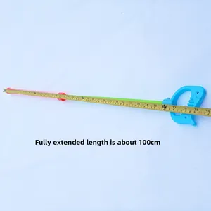 Detail of extendable plastic water gun toy showing 100cm length with measuring tape