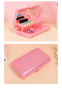 Detail of pink double-layer cosmetic organizer with built-in mirror and compact folding design