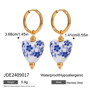 Gold-plated stainless steel heart earrings with blue floral pattern and precise dimensions