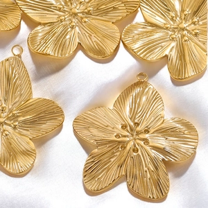 Vintage golden stainless steel flower pendants with textured petals for DIY jewelry making