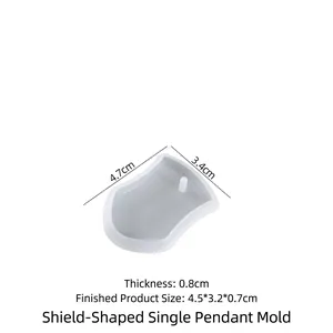 Shield shaped silicone pendant mold for DIY resin crafts with detailed size markers