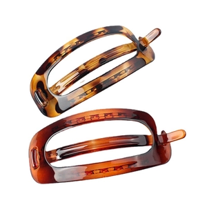 Square leopard print hair clips in amber tortoiseshell finish with spring clamp
