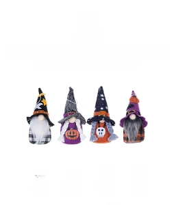 Set of four handmade Halloween gnomes featuring pumpkin, skull, and bat motifs for decor