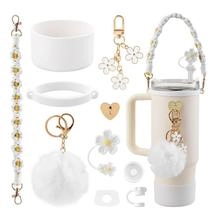 Detailed set of white water bottle accessories including floral bead strap and plush keychain