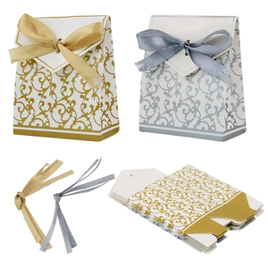 European gold and silver gift boxes for wedding candy with decorative ribbons