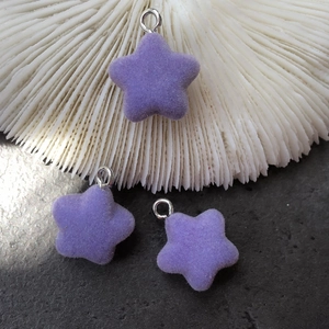 Macro view of purple flocked star pendant with metallic loop for DIY keychain crafts