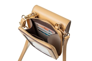 Internal view of beige PU leather crossbody bag showing card slots and gold hardware