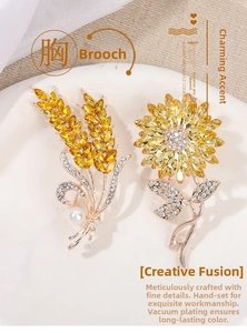 Detail of wheat ear and sunflower brooches with yellow crystals and white pearls