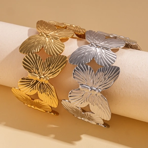 Textured butterfly metal open cuff bracelet in gold and silver finish for women