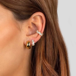 Detail showing 18k gold ear cuff set with rectangular cut cubic zirconia stones
