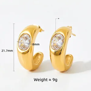 Golden chunky C-shape hoop earrings with oval zircon stone and product dimensions