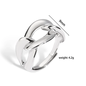 Detail shot of a 9mm silver twisted ring showing 4.2g weight and metal texture