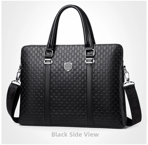 Macro view of men's business briefcase with embossed texture and metal shield logo