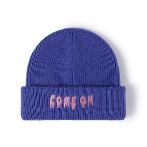 Deep purple knit beanie featuring pink 'COME ON' embroidery and thick ribbed texture