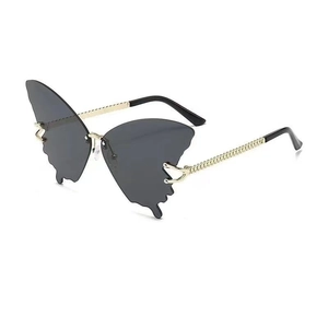 Fashionable butterfly sunglasses with gradient lenses and golden chain metal temples