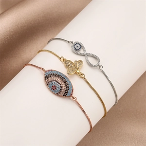 Adjustable pull-cord bracelets featuring bee and evil eye charms with zircon inlays