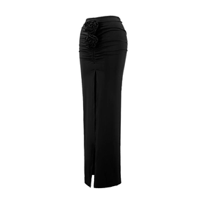 Detail of the elegant 3D floral accents and ruched texture on this black side slit skirt