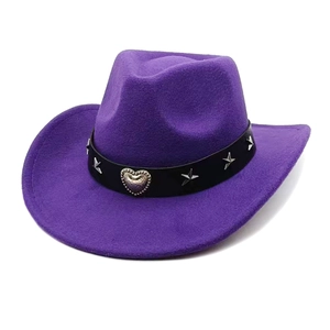 Close-up of purple felt cowboy hat with vintage silver heart and star metal rivets