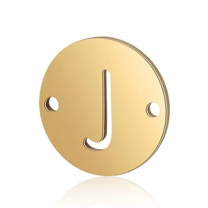 Macro view of gold stainless steel round pendant with hollow J letter and dual holes