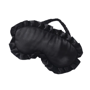 Black satin silk sleep mask with elegant ruffle trim and elastic headband on white