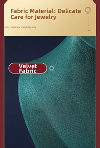 Detail of dark green velvet jewelry bust display stand showing premium fabric texture