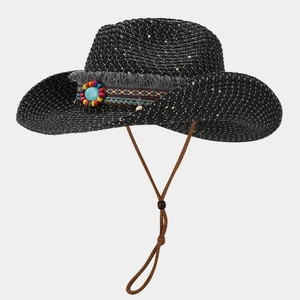 Detail of black straw cowboy hat with turquoise stone and ethnic beaded band