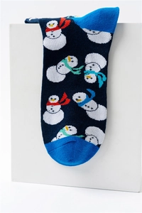 Detail view of dark blue holiday socks featuring cute snowman prints and bright blue cuffs