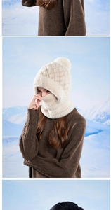 Detailed texture of women winter knit hooded scarf with thick faux fur lining and pompom
