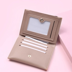 Detail view of khaki PU leather wallet with multiple card slots and clear ID window