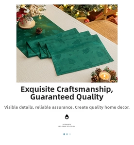 Detail of dark green table runner with jacquard Christmas tree patterns for holiday decor