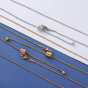 Detailed view of adjustable box chains in silver, gold and rose gold finishes