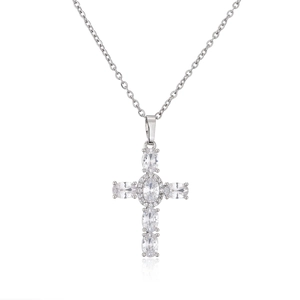 Detailed close-up of a silver cross necklace featuring six clear oval-cut zircon stones