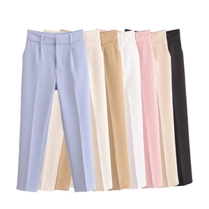 Close-up of high-waist trousers in various pastel colors and minimalist design
