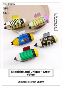 Detailed view of pencil-shaped hair claws with daisy and striped patterns on tray