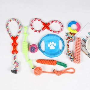 Macro shot of 10 colorful braided cotton rope dog chew toys for dental cleaning and play