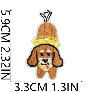 Embroidered brown sausage dog patch with yellow crown and detailed stitching