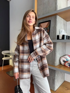 Women's oversized plaid flannel shirt jacket in brown and beige casual long sleeve style