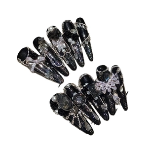 Gothic stiletto press-on nails with black glitter and luxury 3D butterfly jewelry