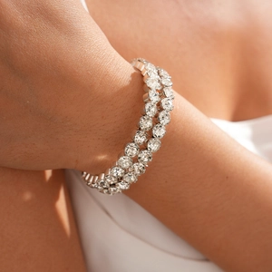 Macro detail of luxury double-row diamond tennis bracelet with sparkling zircon stones