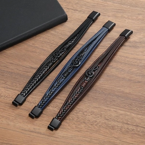 Three multilayer leather bracelets with treble clef charms and magnetic clasps