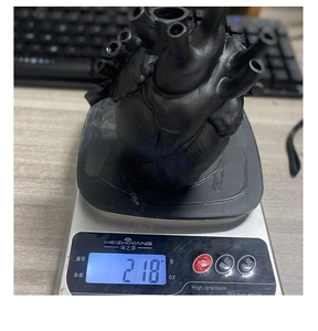 Weight display of 218g for a black anatomical heart vase in matte finish