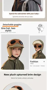 Detailansicht der abnehmbaren Schutzbrille und des Plüschfutters der Kinderfliegermütze